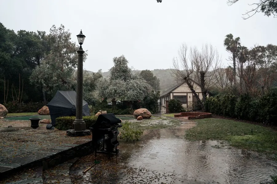 Residential yard with standing water and flooding after heavy Nashville rain